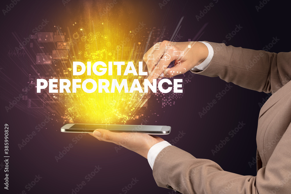 Obraz premium Close-up of a touchscreen with DIGITAL PERFORMANCE inscription, innovative technology concept