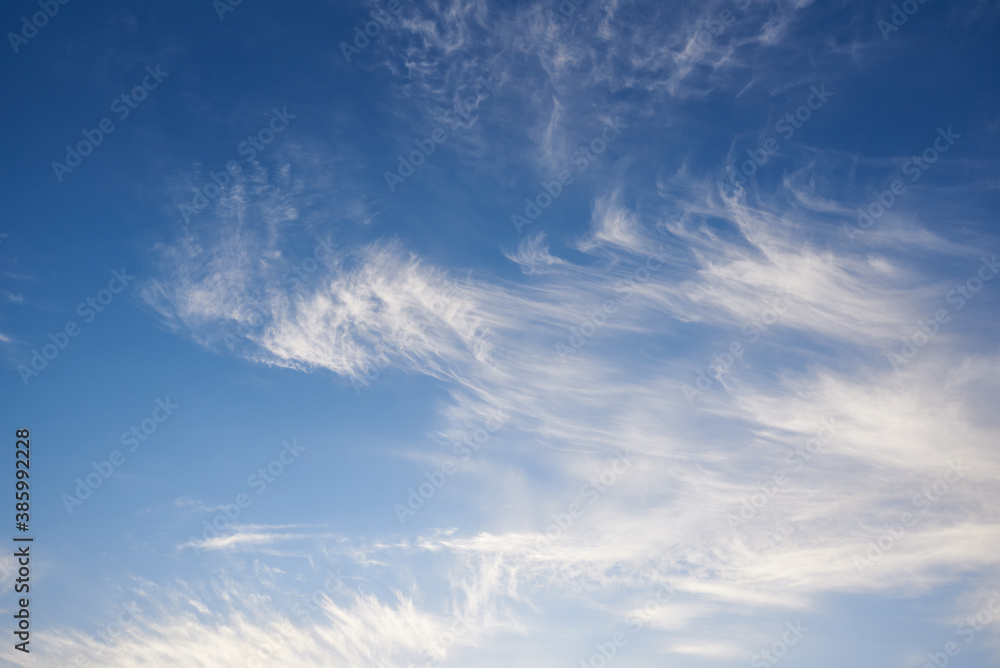 Obraz premium Flying white clouds and blue sky.