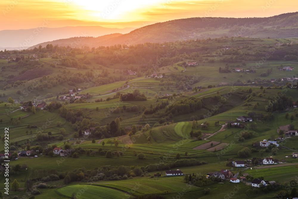 Fototapeta premium Evening in the countryside area and fields of local peasants