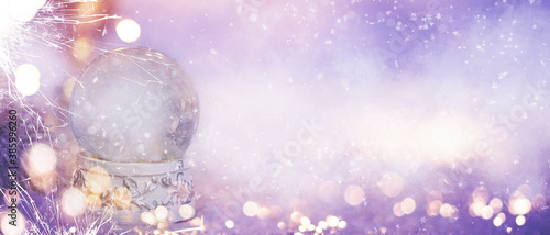 Christmas and New Year holidays background. Christmas Snow globe with the falling snow