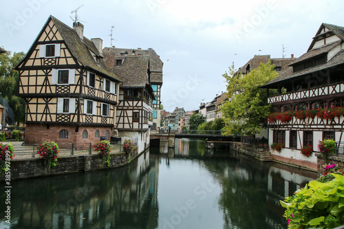 The center of the French city of Strasbourg with the canals and river and many historic houses. 