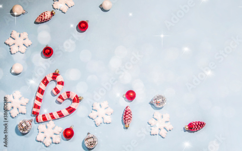 Merry Christmas and Happy New Year, Holidays greeting card with blurred bokeh background