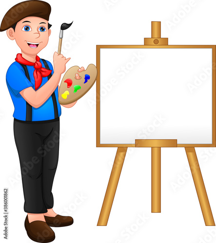painter boy posing in front of the canvas