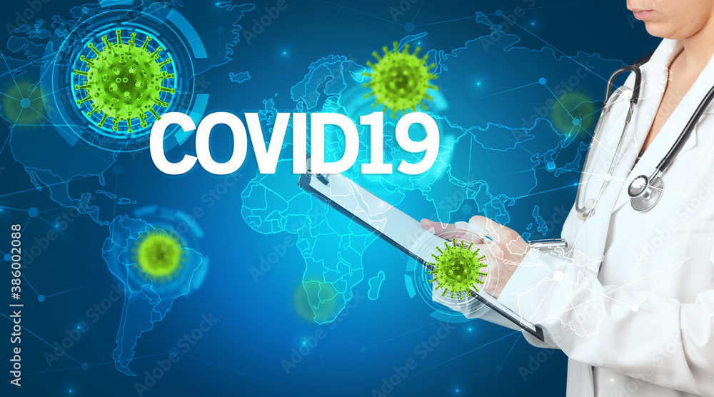 Doctor fills out medical record with COVID19 inscription, virology concept Doctor fills out medical record with COVID19 inscription, virology concept