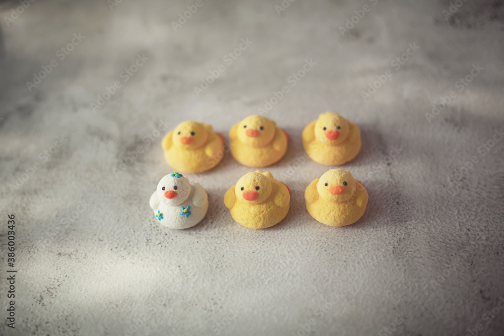marshmallows in the form of ducks of different colors
marshmallows in the form of ducks of different colors