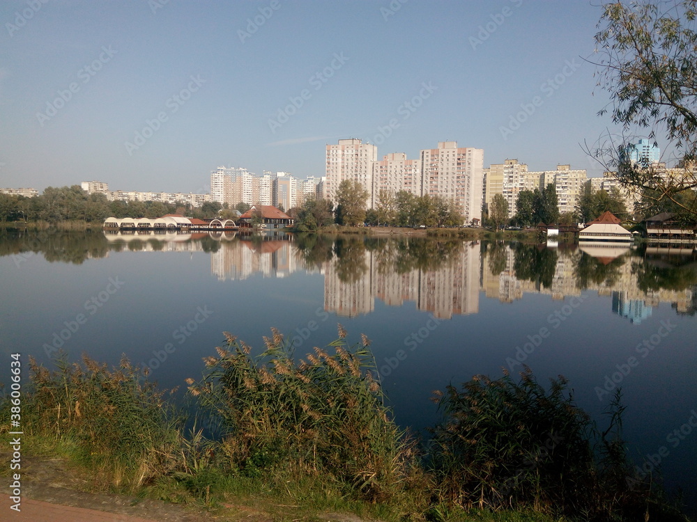 urban skyline reflected in the water urban skyline reflected in the water
