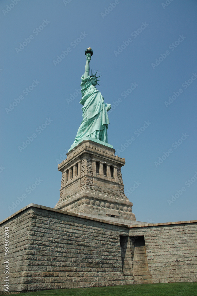 statue of liberty in all its glory on a beautiful day