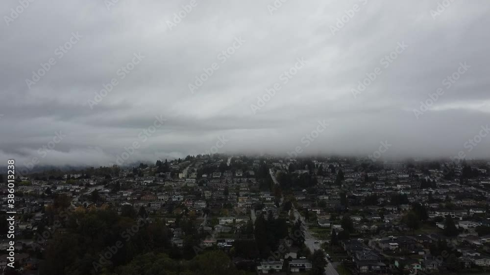 Aerial view of american neighbourhood small houses on a cloudy day Aerial view of american neighbourhood small houses on a cloudy day