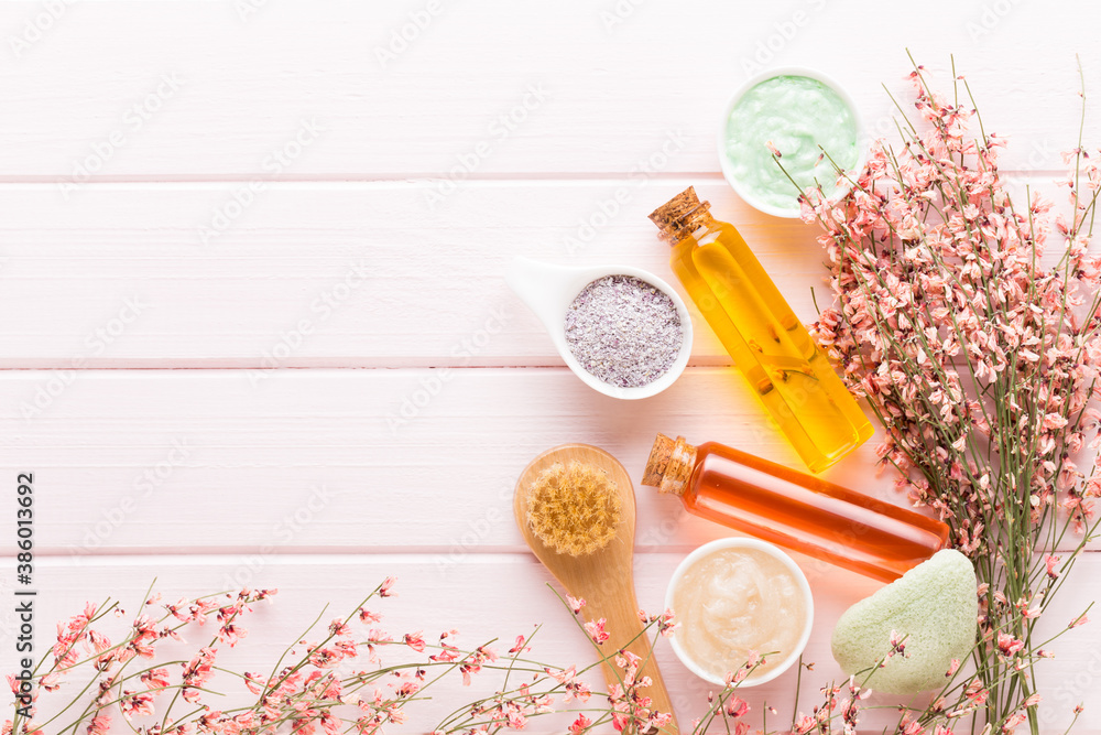 Beauty and aromatherapy concept with spa set on pastel rustic wooden background. Beauty and aromatherapy concept with spa set on pastel rustic wooden background.