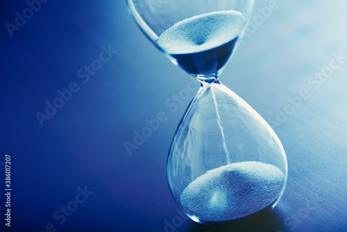 Fotografie Time past concept with hourglass