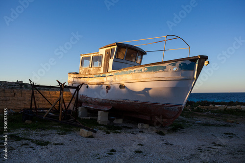 Old boat on shore, Malta