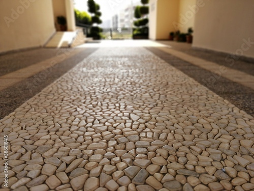  decorative stone pavement road in the park