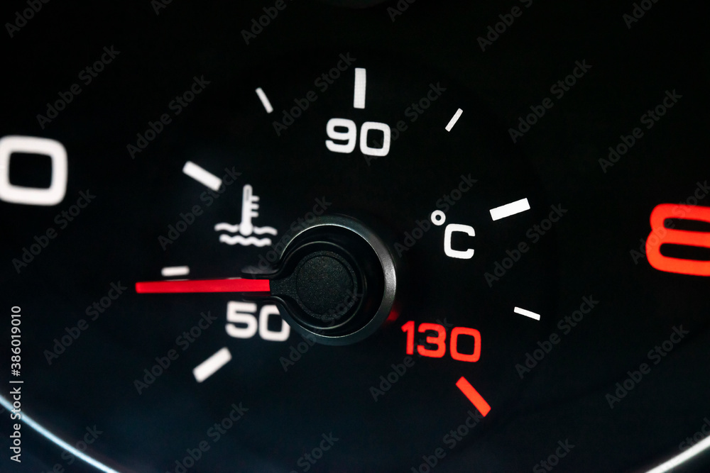 Color close up image of a car's coolant temperature gauge