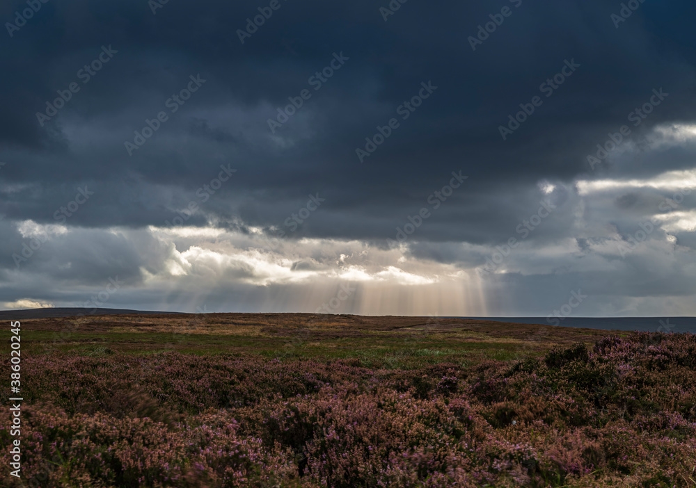 An autumnal weather HDR landscape image of Crepuscular Rays over the Northern Pennines, England.