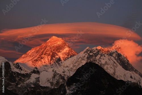 Scenic red sunset on Mount Everest Sagarmatha and Lhotse as seen from Gokyo Ri with cloud above Everest, Gokyo, Sagarmatha Khumbu Region, Nepal Himalaya