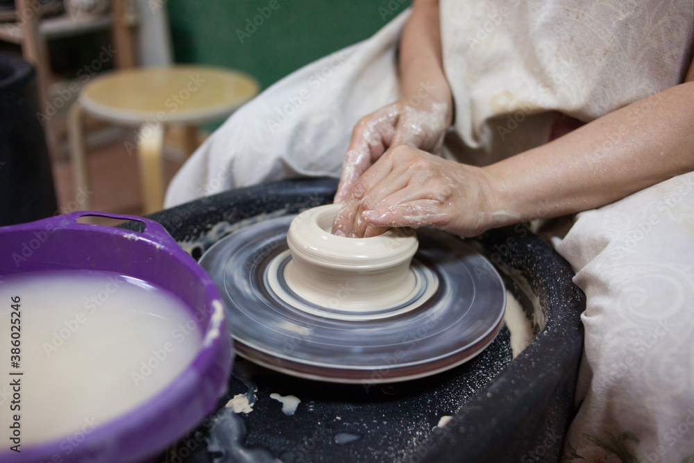 Fototapeta premium hands of a potter