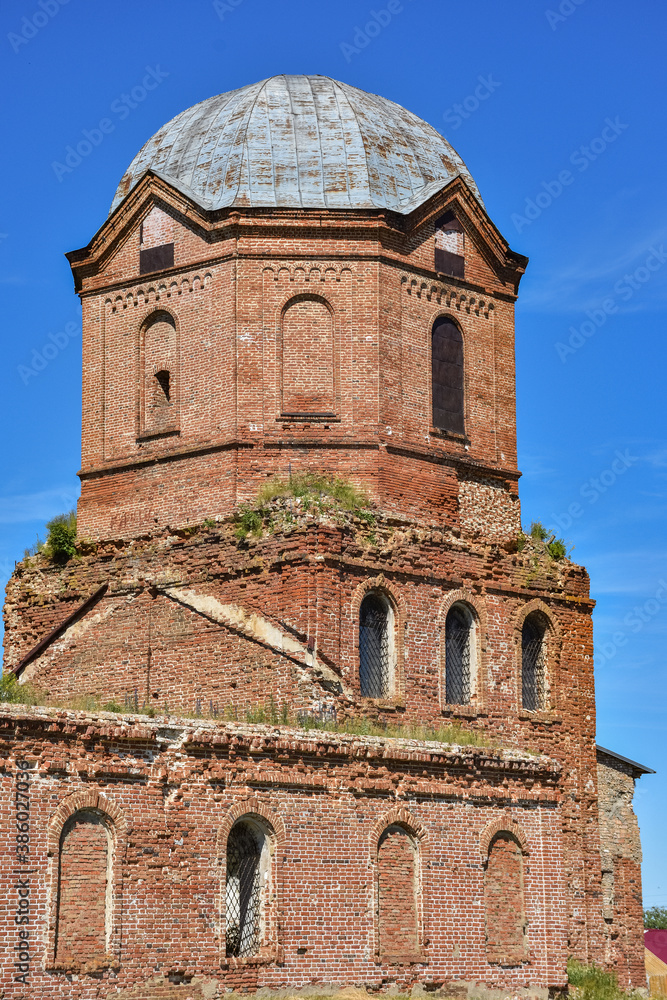 Fototapeta premium Old brick abandoned orthodox Church of the Kazan Icon of the Mother. an abandoned Kazan church in the village of Bogorodskoe