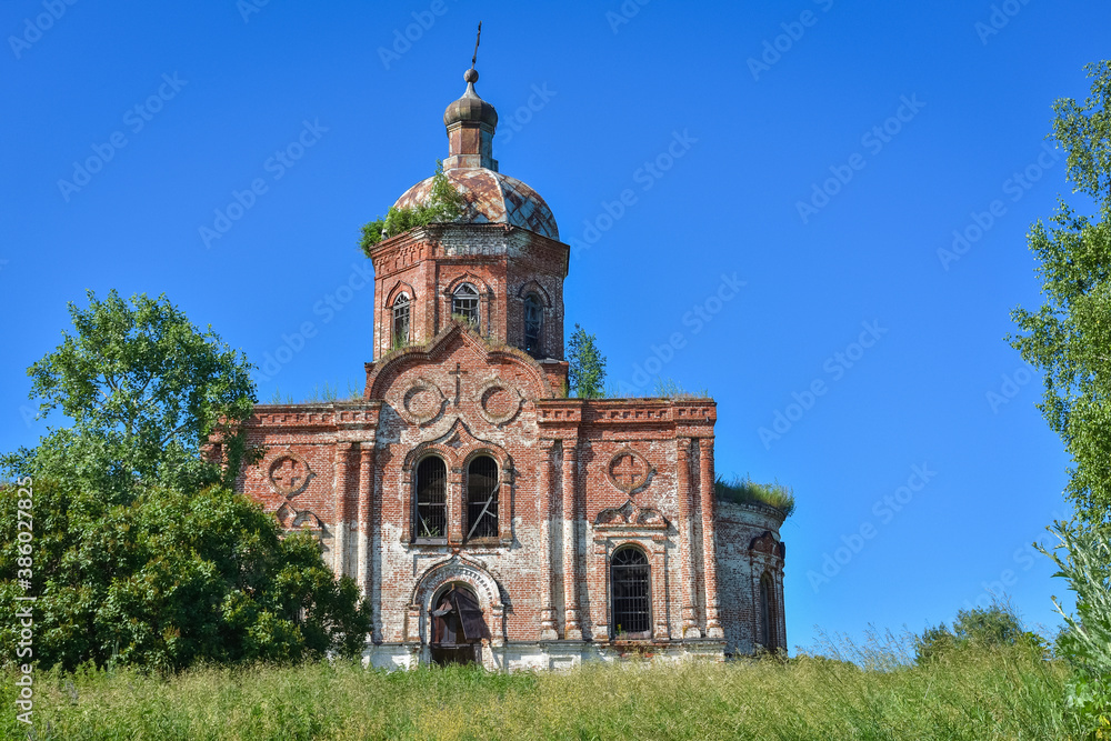 Old brick abandoned orthodox Church of the Trinity Church. abandoned Trinity Church in the village of Zasechnoye. abandoned red brick church in the thicket, abandoned temple in the field Old brick abandoned orthodox Church of the Trinity Church. abandoned Trinity Church in the village of Zasechnoye. abandoned red brick church in the thicket, abandoned temple in the field