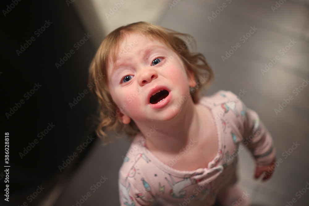 Close up Portrait of cute 18 month Old Crying Toddler Girl with Big Blue Eyes Close up Portrait of cute 18 month Old Crying Toddler Girl with Big Blue Eyes