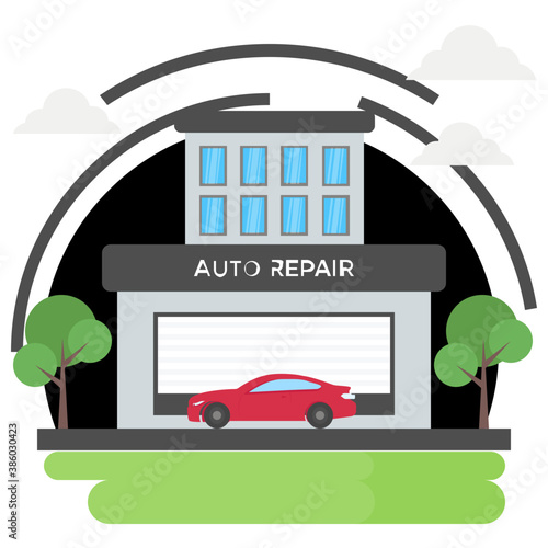 
Car parked outside building facade with auto repair sign
