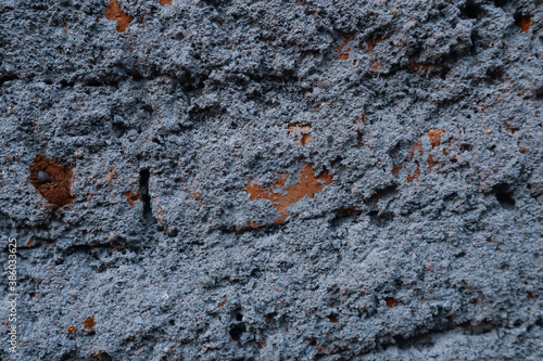 Background with red bricks. Mossy and cracked wall background.