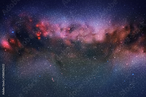 Space background with night starry sky and Milky Way. Red blue nebula