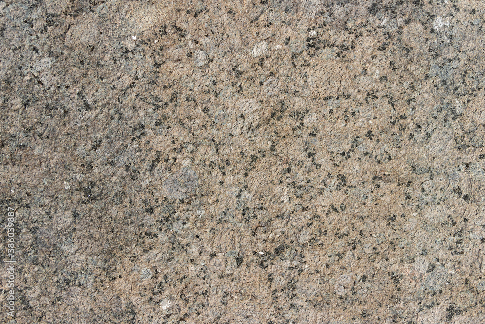 The texture of a natural stone slab from polished granite. The texture of a natural stone slab from polished granite.