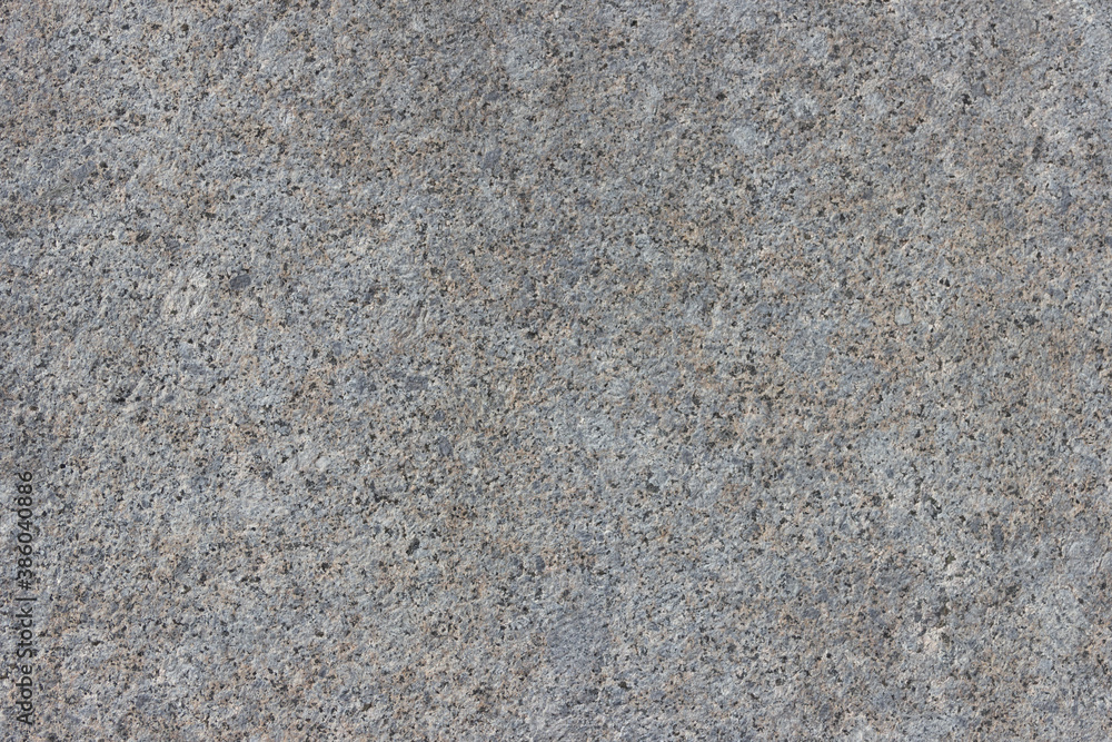 The texture of a natural stone slab from polished granite. The texture of a natural stone slab from polished granite.