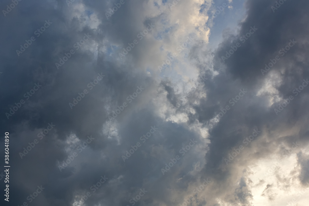 Cloudy sky with textured volume clouds on a cloudy day.