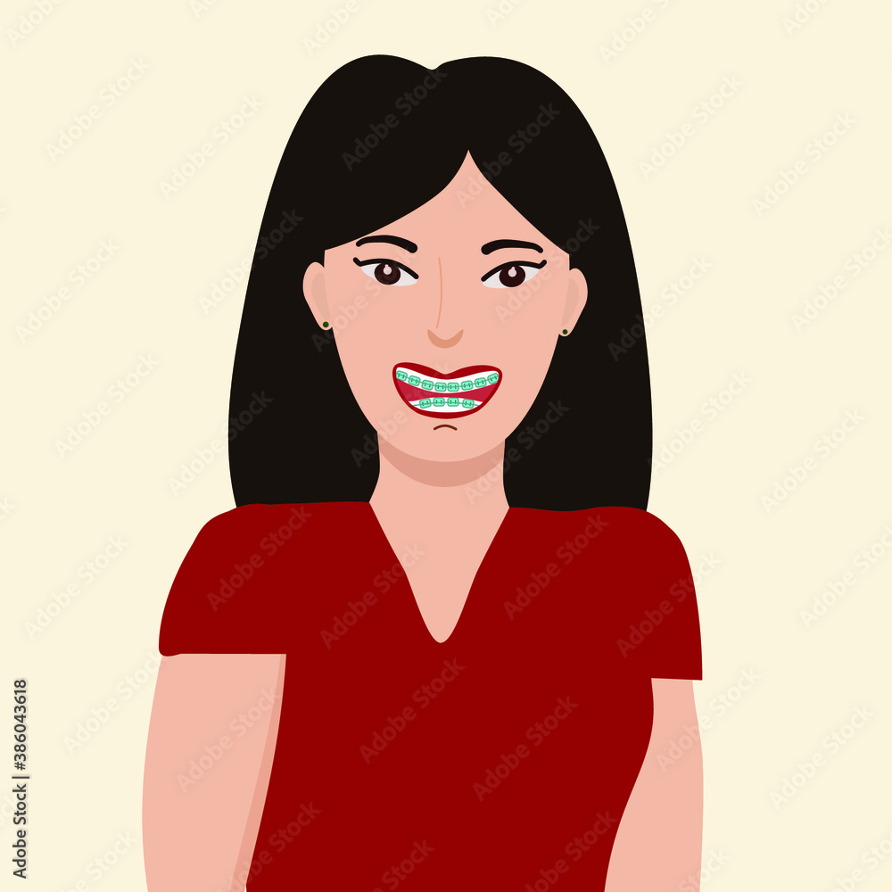 Fototapeta premium Asian young woman smiles with braces on her teeth. Advertising dentistry and a beautiful smile. The concept of care for the oral cavity