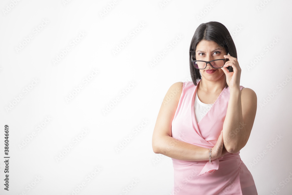 sexy woman in studio posing with casual attire and glasses sexy woman in studio posing with casual attire and glasses