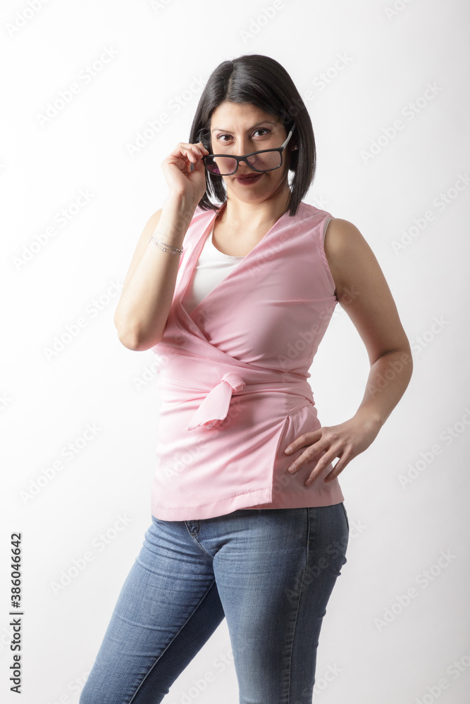 sexy woman in studio posing with casual attire and glasses sexy woman in studio posing with casual attire and glasses