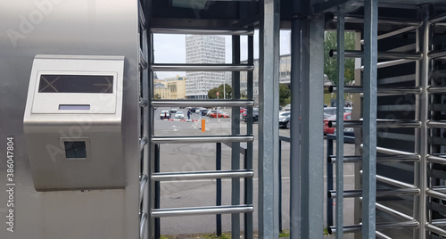 Entrance to the football stadium during the day without people. Secure entrance gates - outdoor turnstiles at the stadium. Guarded entrance.