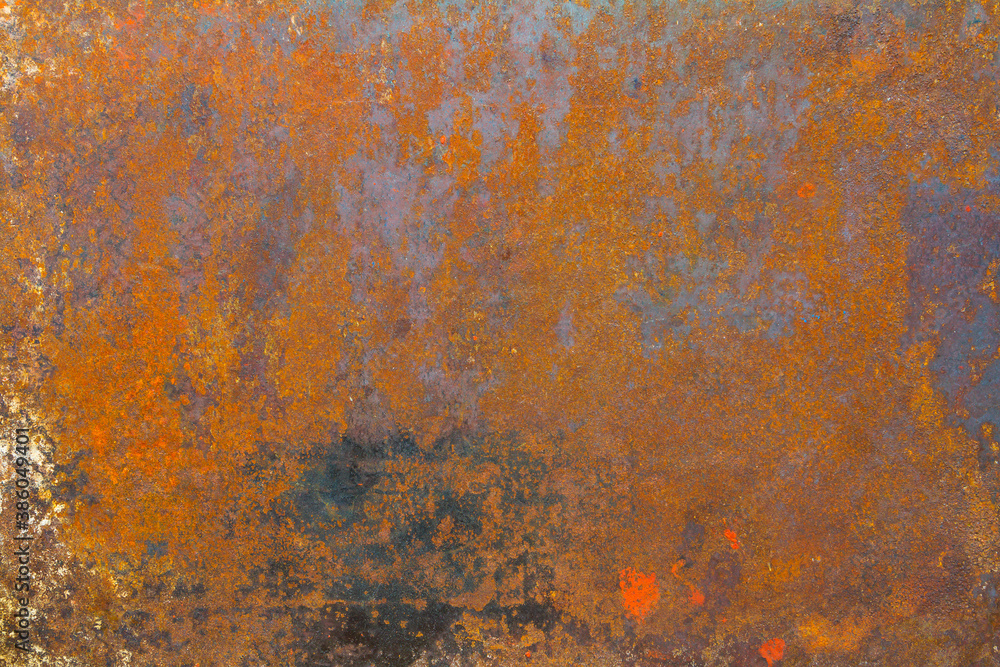 Rough rusty metal surface with stains, texture