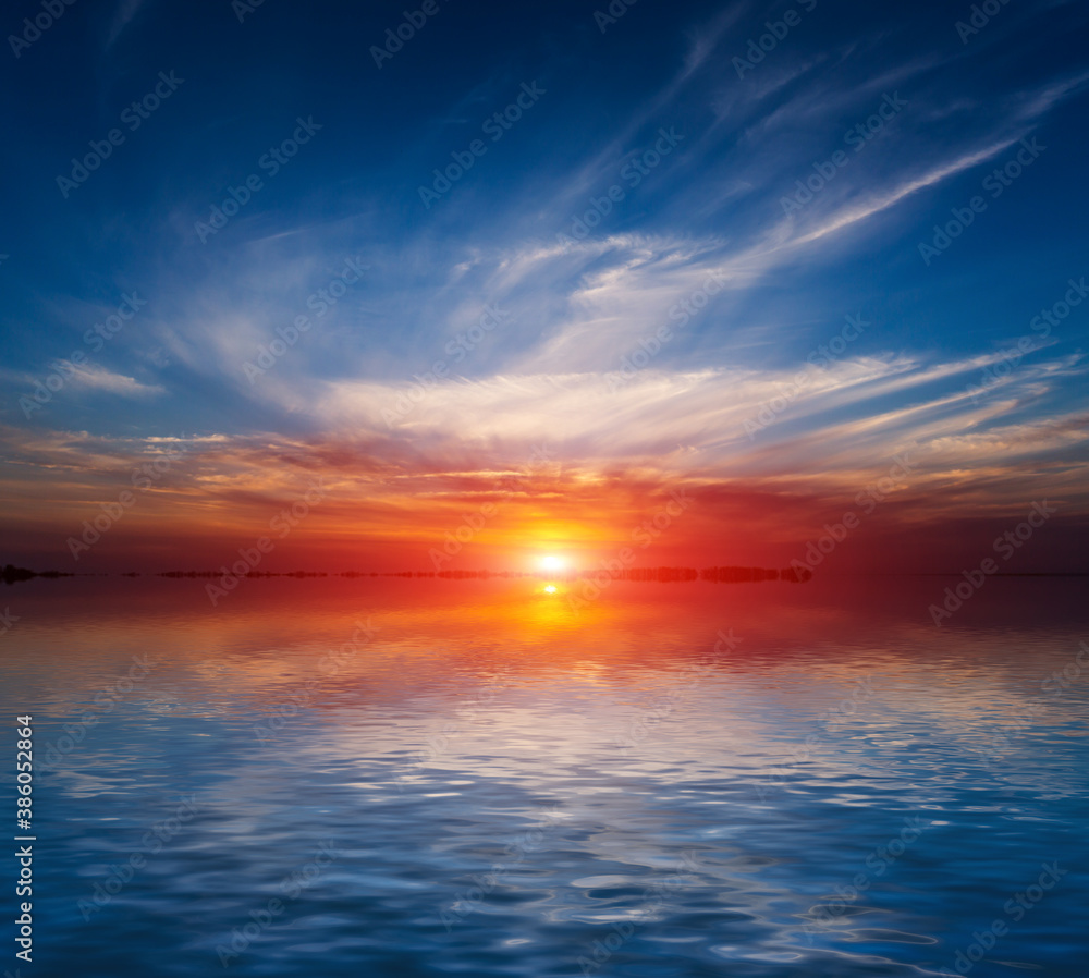 sunset scene over lake water