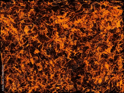 Fire blast - flames seen from above on a black background - background for the cover.