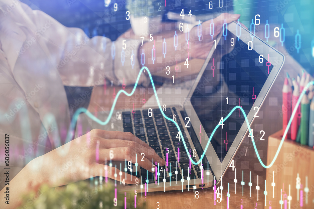 Double exposure of woman hands typing on computer and forex chart hologram drawing. Stock market invest concept. Double exposure of woman hands typing on computer and forex chart hologram drawing. Stock market invest concept.