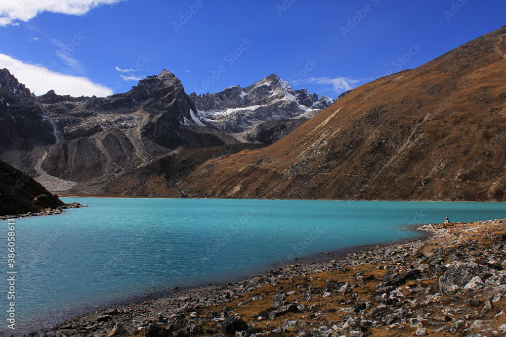 Gokyo blue mountain lake with Renjo La Pass visible near Gokyo Village, Sagarmatha Khumbu Region, Nepal Himalaya