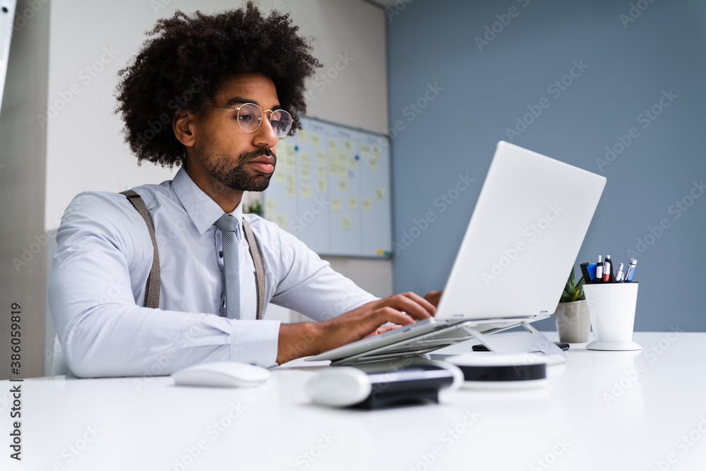 African American Business Man Using Laptop Computer African American Business Man Using Laptop Computer
