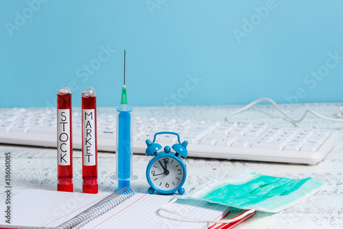 Word writing text Stock Market. Business photo showcasing Particular market where stocks and bonds are traded or exhange Extracted blood sample vial with medical accessories ready for examination photo
