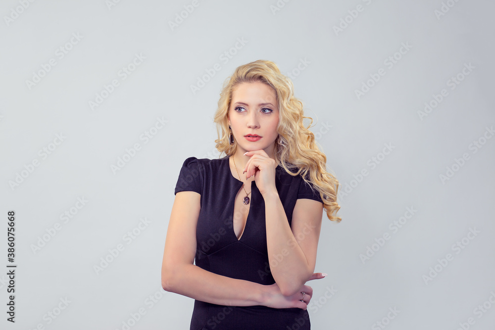 Beautiful pensive woman in black dress Beautiful pensive woman in black dress