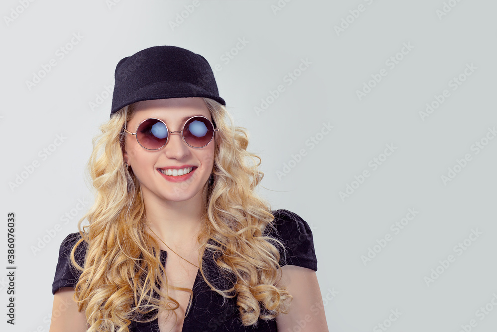 Stylish woman in hat and sunglasses Stylish woman in hat and sunglasses