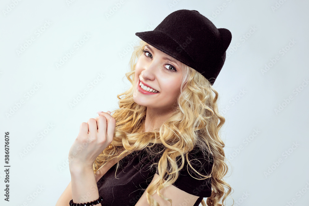 Adorable blond woman in stylish hat Adorable blond woman in stylish hat