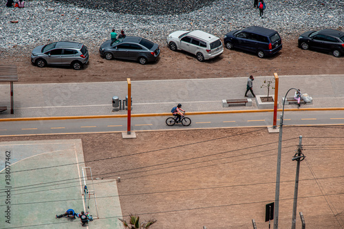 tracks close to the beach and someone on the bike