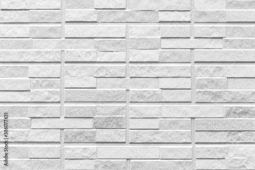 Modern white stone brick wall pattern and seamless background