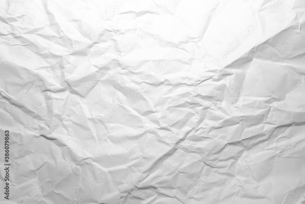 white and gray crumpled paper texture background. crush paper so that it becomes creased and wrinkled. white and gray crumpled paper texture background. crush paper so that it becomes creased and wrinkled.
