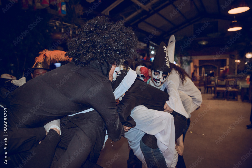 a group of friends disguised as monsters for the day of HALLOWEEN

