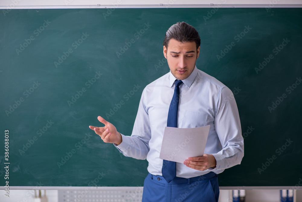 Young man employee in business presentation concept Young man employee in business presentation concept