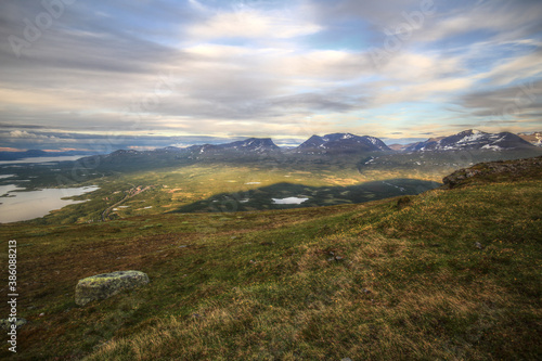 Canvastavla In summer nights here on Mount Nuolja, the mountain casts a shadow on Abisko val