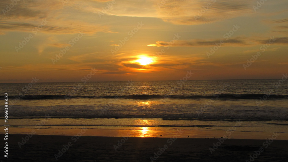Sunset on the beach in Ecuador during Summer